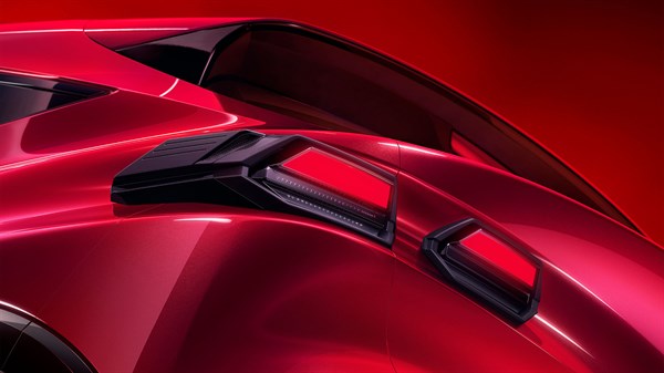 feux arrière sculptés dans la ligne de coffre - Renault Clio